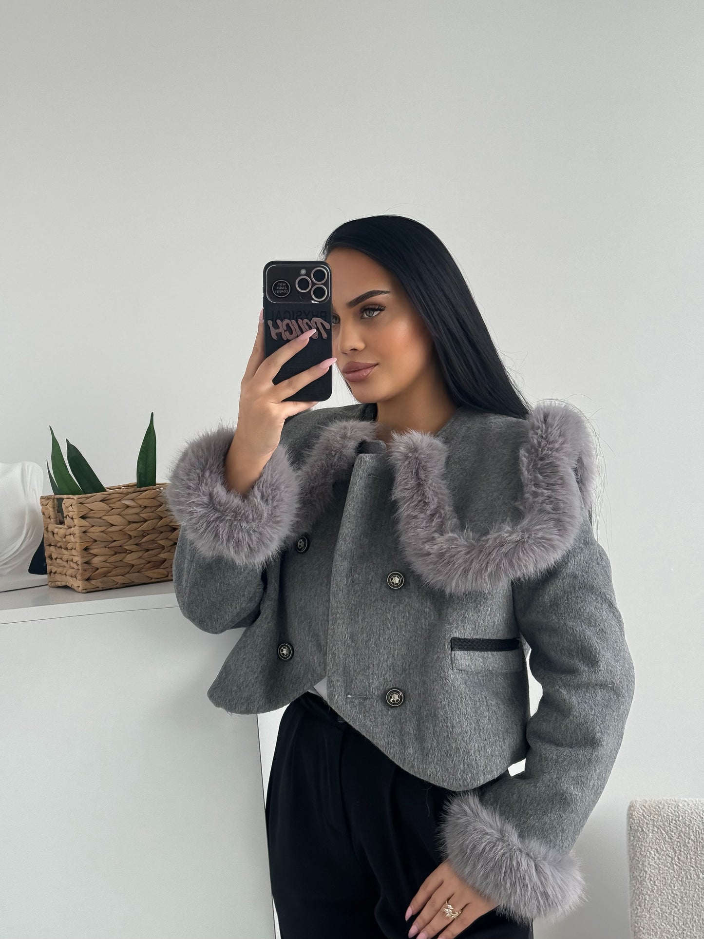 Grey jacket with luxurious faux fur details on the collar and cuffs